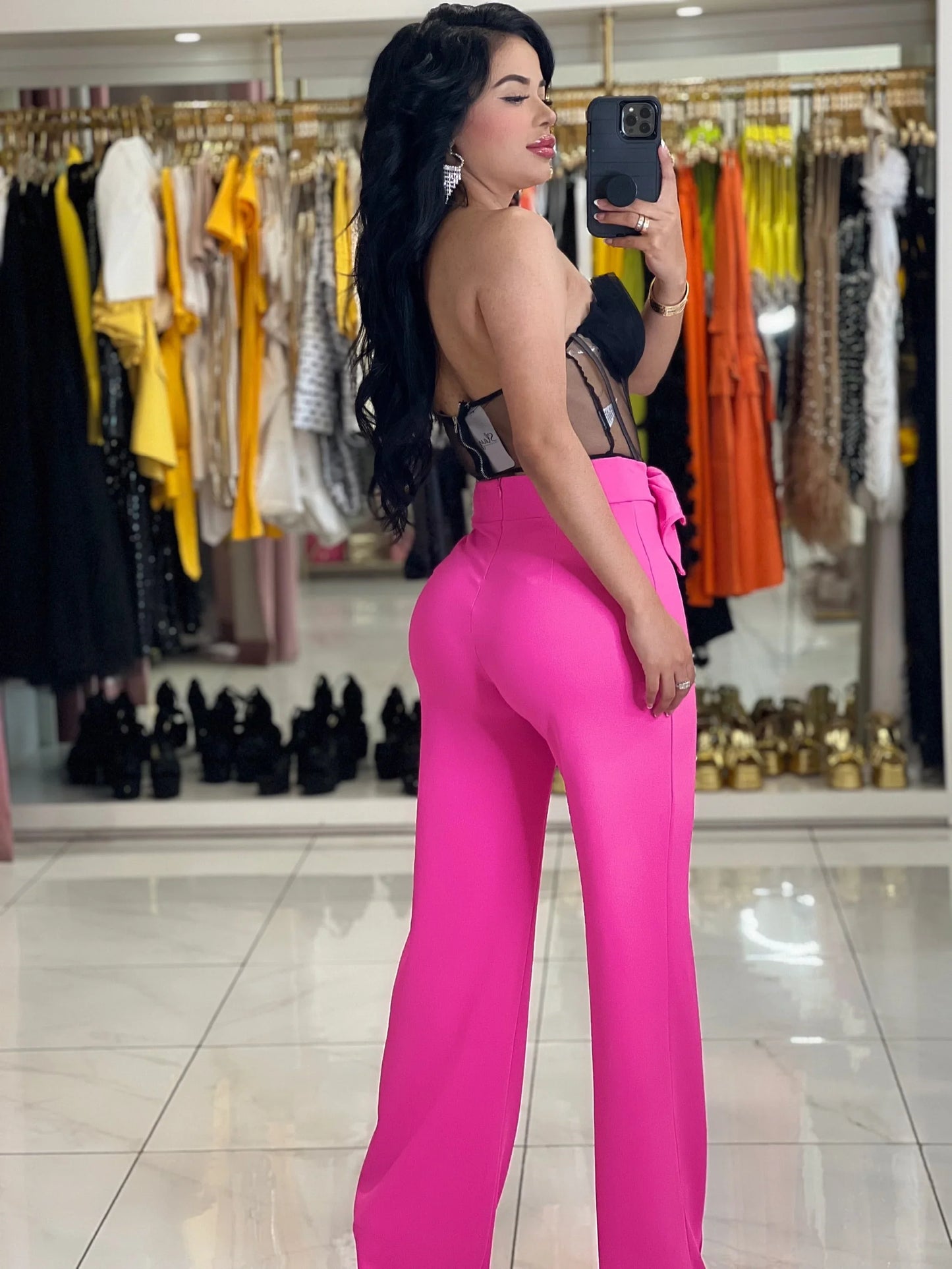 Donna high-waist, hot pink, wide-leg semi-stretch pants with a back zipper and rhinestone buckle.