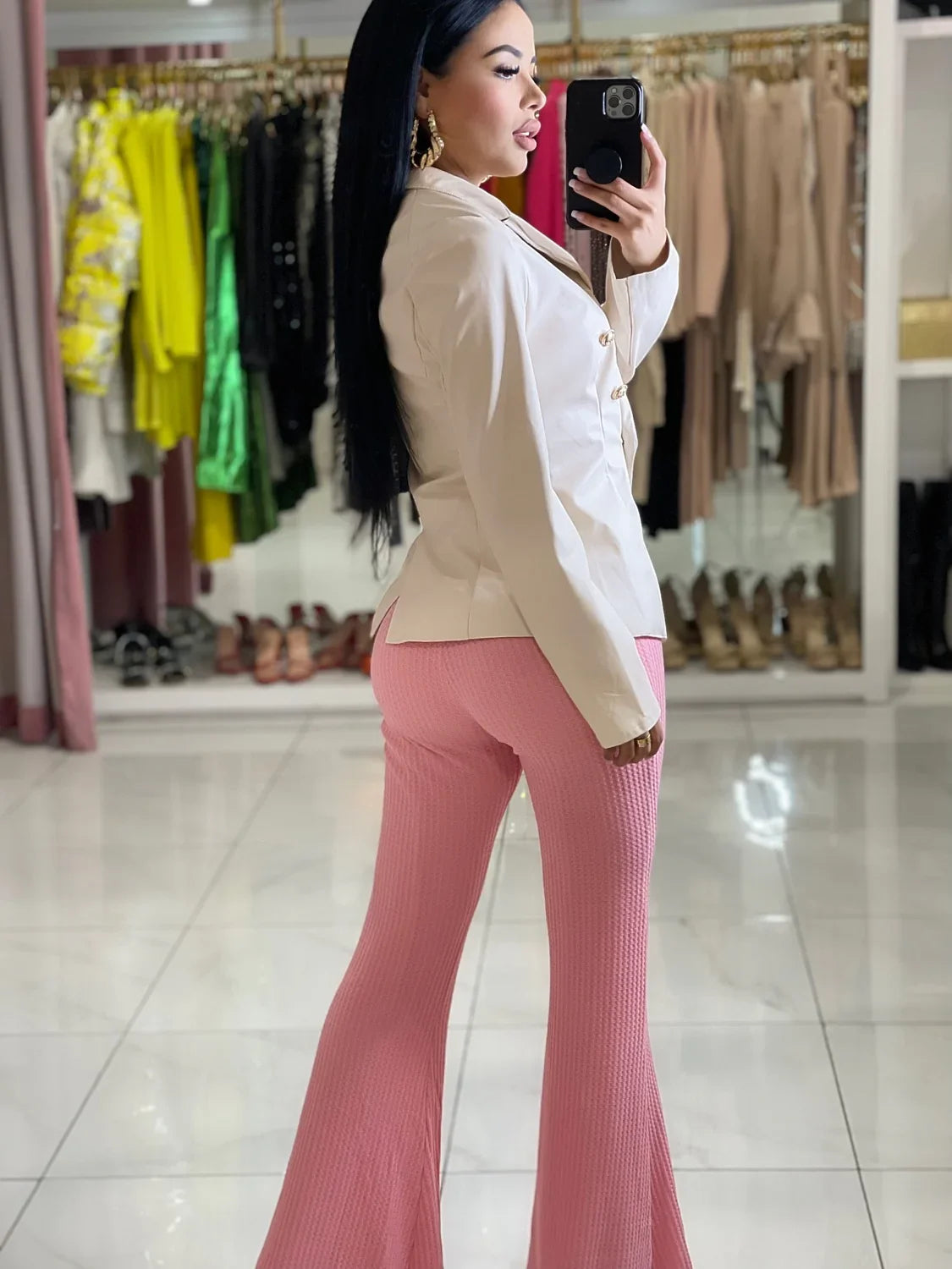 Mia Pants: Pink stretch knit flare trousers, high-waisted, with a side zipper.