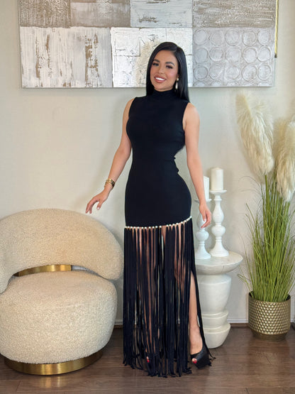 Black Maxi Fringe Dress with pearls, high neck, and side slit.