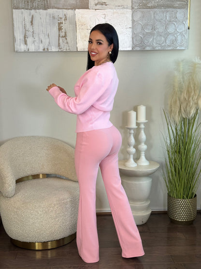 Sweetie Top: Pink long sleeve knit top and matching pants set with gold button detail.