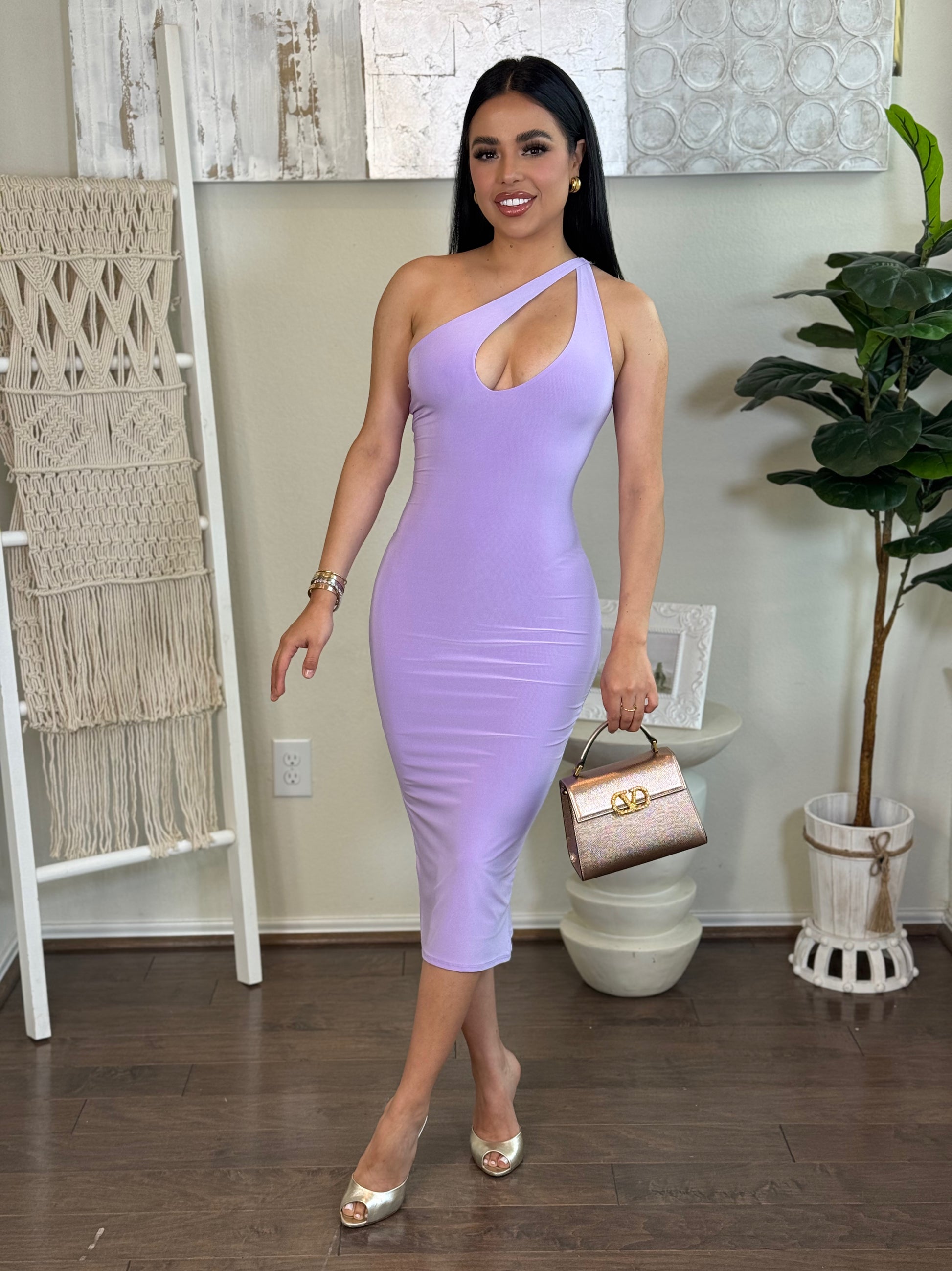 Lilian Asymmetric Dress: Lavender one-shoulder midi dress with front cut-out, form-fitting stretch material.